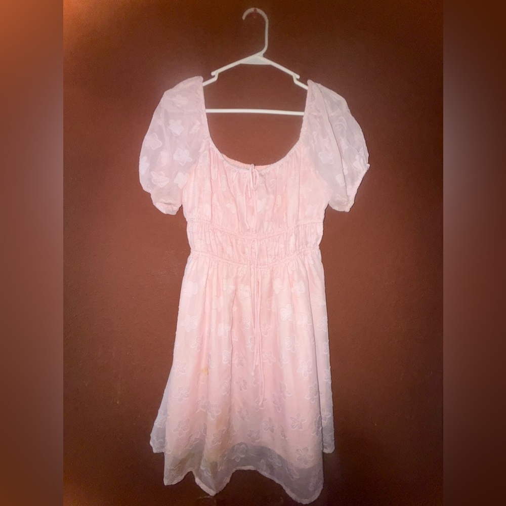 Light pink short dress.